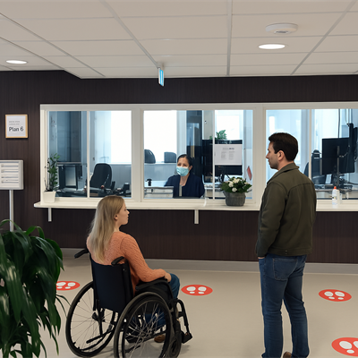 reception kliniken kvinna man rullstol